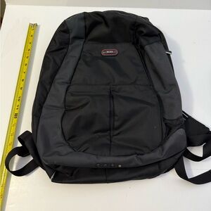 Tumi Black Backpack. Read description.